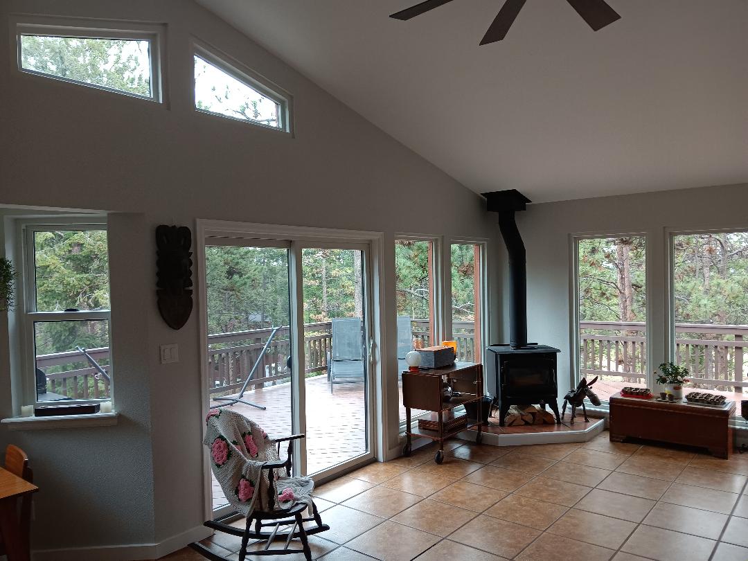 Bailey, CO. Andersen 100 series fibrex composite windows and patio door interior color White