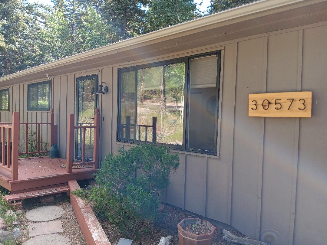 Conifer, CO. Kings Valley Andersen 100 series fibrex composite color black windows installed