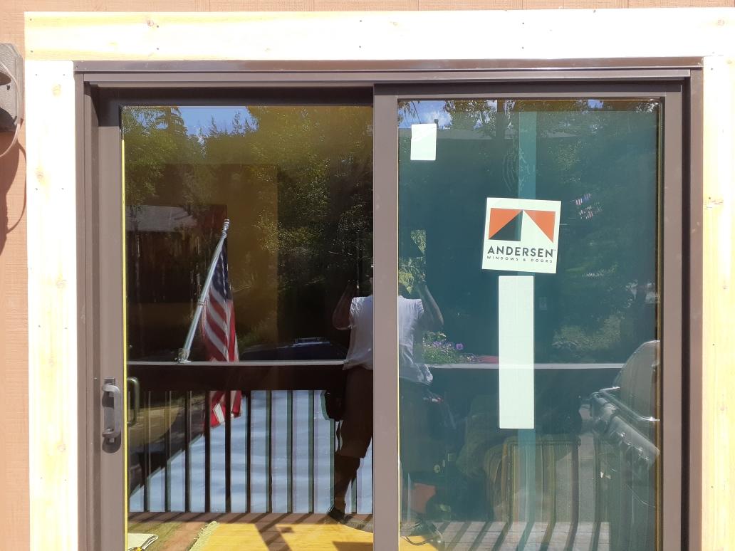 Evergreen, CO. Andersen 200 series wood-clad patio sliding door exterior color Terratone