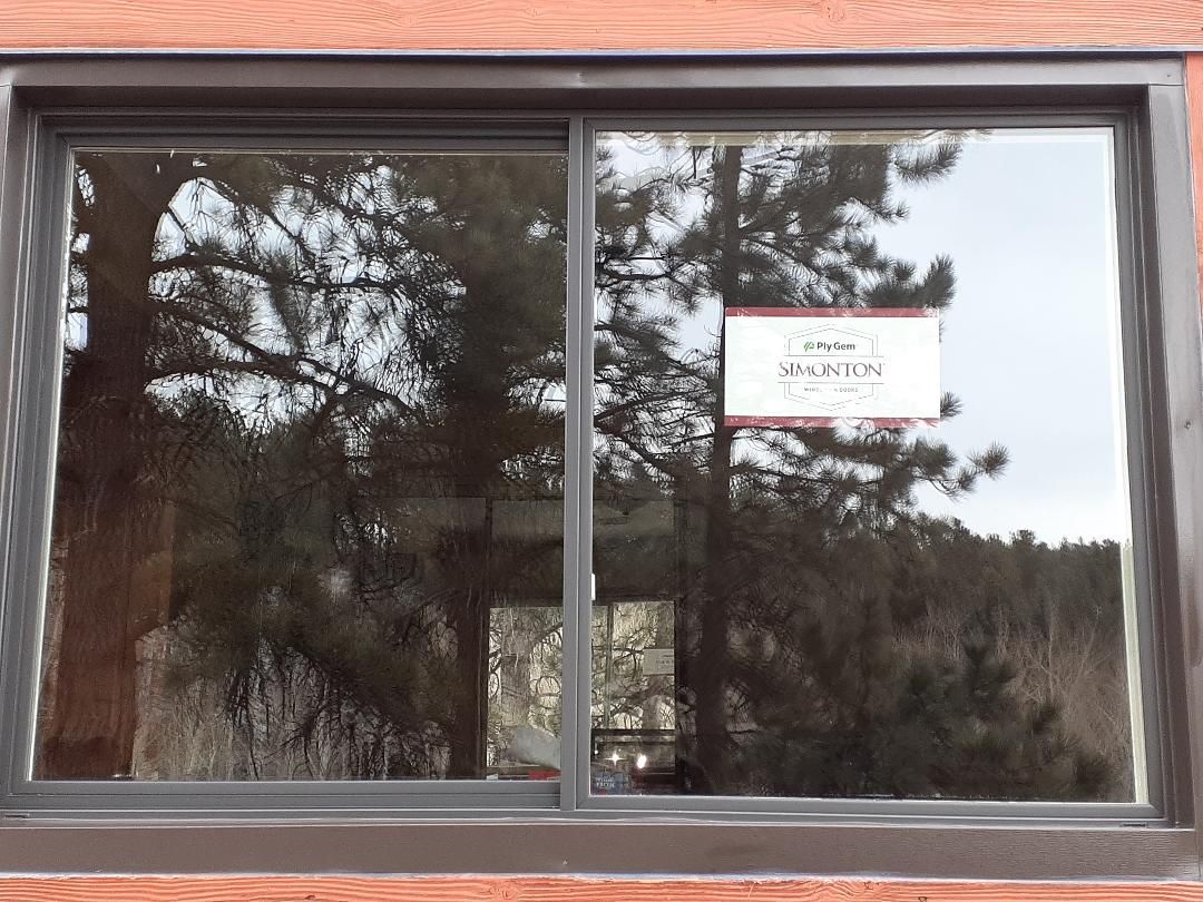 Bailey, CO. Simonton Daylight-Max Vinyl slider window color bronze